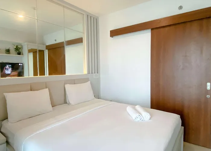 Minimalist Studio Grand Kamala Lagoon Apartment By Travelio
